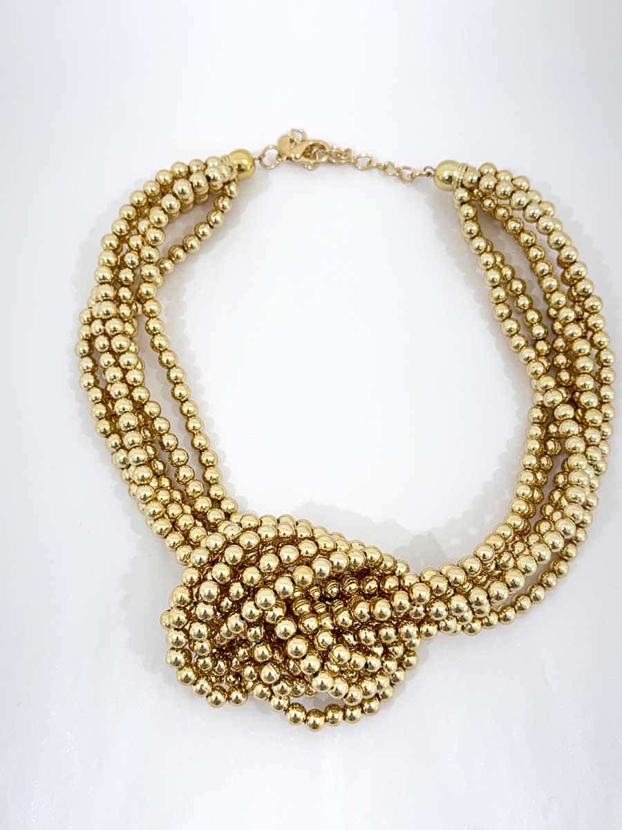 COLLANA CON PERLE COLOR ORO ART. 4561